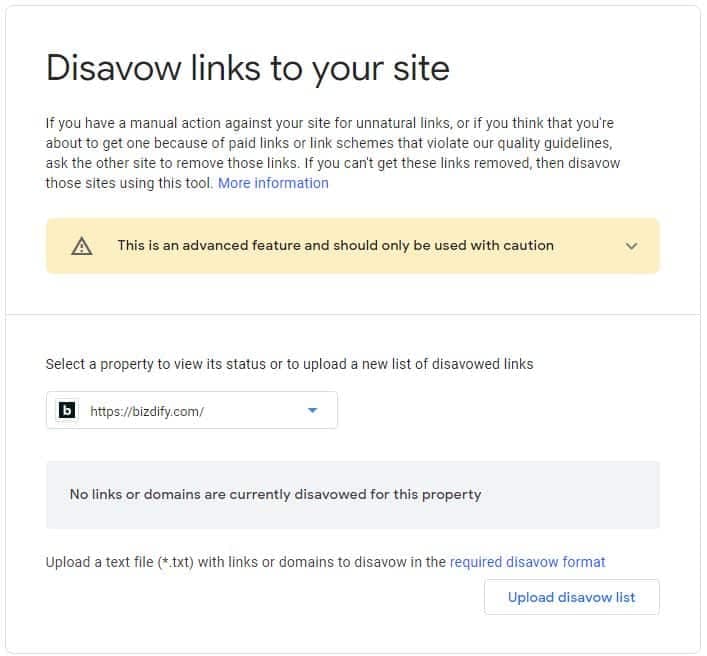 The Google Search Console disavow tool: the 'Disavow links to your site' screen with a property selected, showing no links currently disavowed and an Upload disavow list button